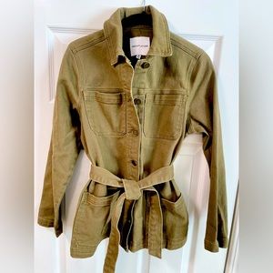 Olive green denim utility jacket with tie belt